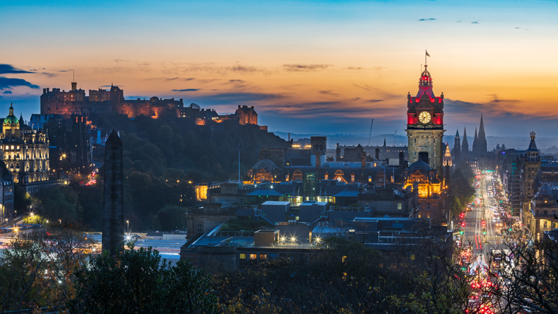 Edinburgh city panorama from Calton Hill at blue hour, Edinburgh Castle illuminated on the skyline — Raff Karva Photography